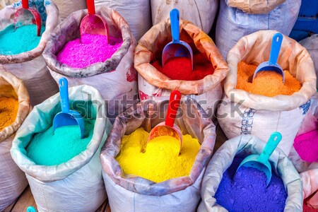 Colorful pigments in bags Stock photo © dinozzaver