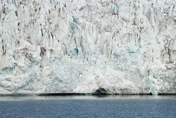 Close up of blue ice in the glacier by the sea, Svalbard Stock photo © dinozzaver