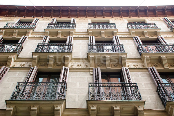 House with balconies, Madrid Stock photo © dinozzaver