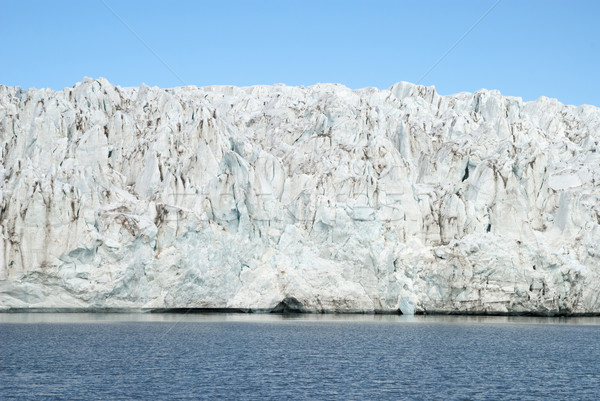 Close up of blue ice in the glacier by the sea, Svalbard Stock photo © dinozzaver