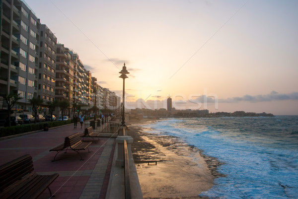 Promenade Sonnenuntergang Malta Strand Himmel Wasser Stock foto © dinozzaver