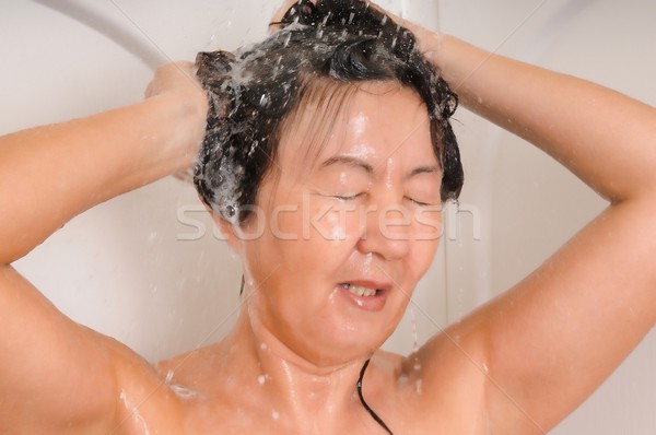 Xampu cabelo chuveiro asiático mulher lavagem Foto stock © diomedes66