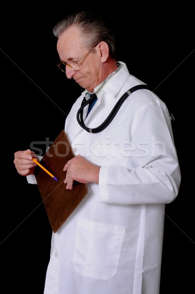 старший врач стетоскоп изолированный черный Сток-фото © diomedes66