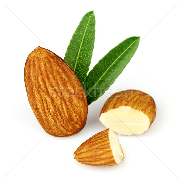 Almonds kernel with leaves Stock photo © Dionisvera