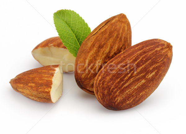 Almonds kernel with leaves Stock photo © Dionisvera