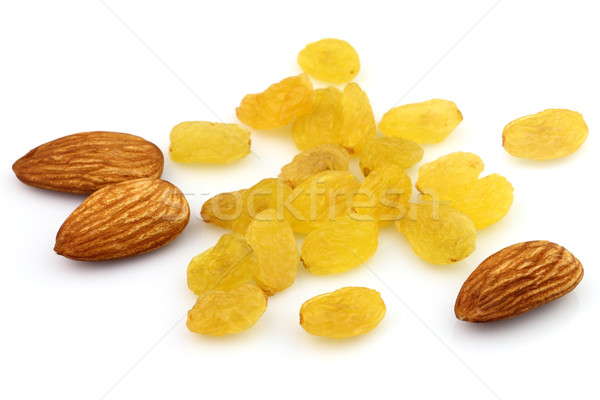 Almonds kernel with raisins Stock photo © Dionisvera