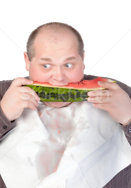 Obese man eating watermelon Stock photo © Discovod