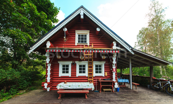 Czerwony kabiny lasu wakacje domu drzewo Zdjęcia stock © Discovod