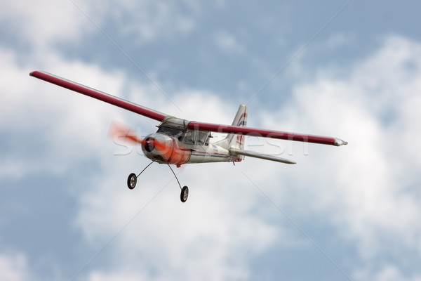 RC model airplane flying in the blue sky Stock photo © Discovod