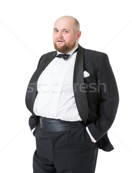 Jolly Fat Man in Tuxedo and Bow tie Shows Emotions Stock photo © Discovod