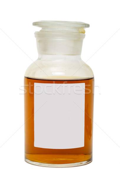 Large Glass Jar with a Lid, Filled with Dark Yellow Honey Stock photo © Discovod