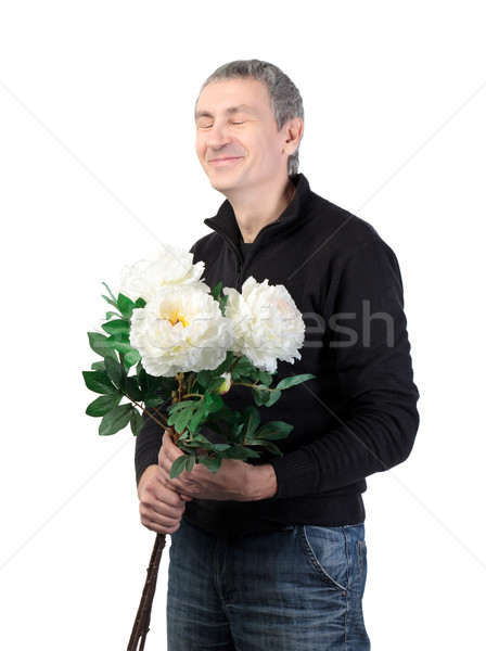 Man holding a bouquet of flowers Stock photo © Discovod