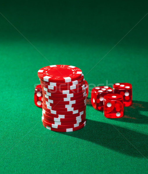 Red poker chips and red dice Stock photo © Discovod