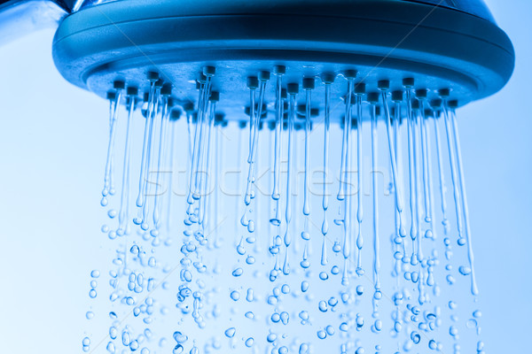 Zuhanyfej fut víz kék fürdőkád tiszta Stock fotó © Discovod