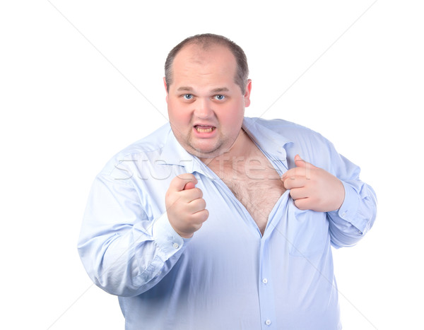 Fat Man in a Blue Shirt, Showing Obscene Gestures Stock photo © Discovod