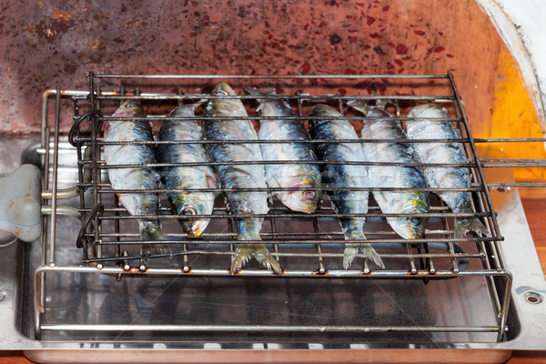 Fresh sardines on the grill Stock photo © Discovod