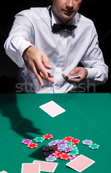 Gentleman in white shirt, playing cards Stock photo © Discovod