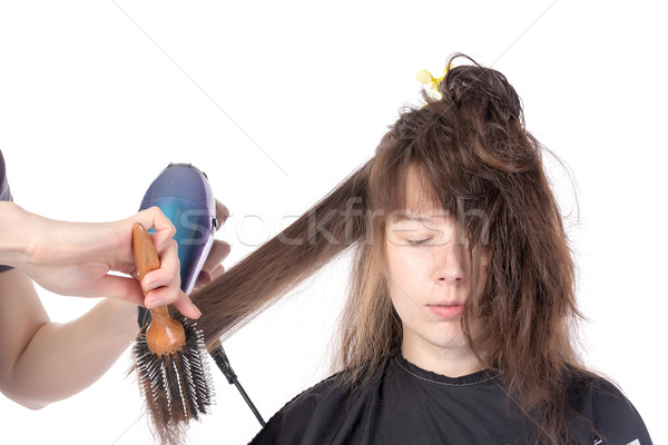 Woman enjoying having her hair blow dried Stock photo © Discovod