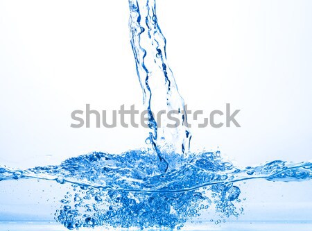 Stream of Water Falling into the Water Stock photo © Discovod
