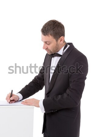 Man in a bow tie completing a form Stock photo © Discovod