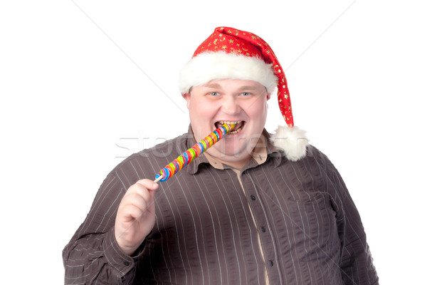 Cheerful fat man in Santa hat Stock photo © Discovod