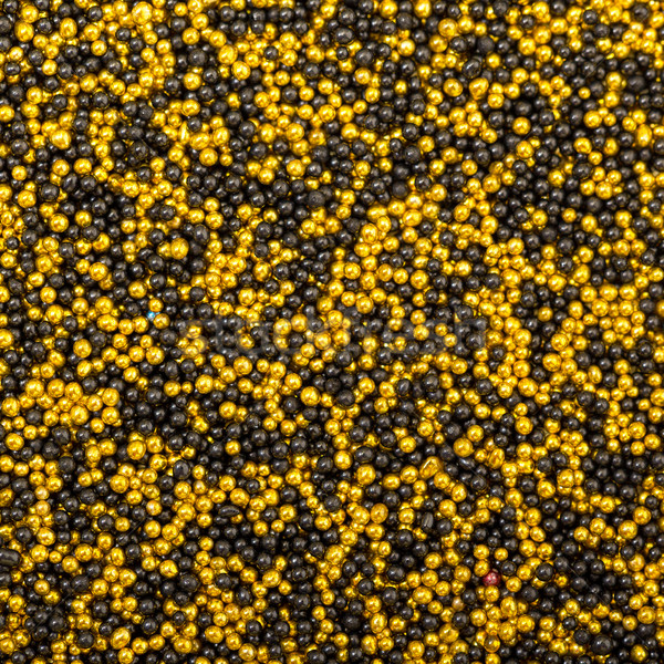 Background from Yellow and Black Balls of Bead Stock photo © Discovod