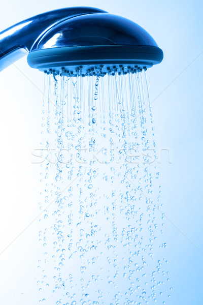 シャワーヘッド を実行して 水 青 バス クリーン ストックフォト © Discovod