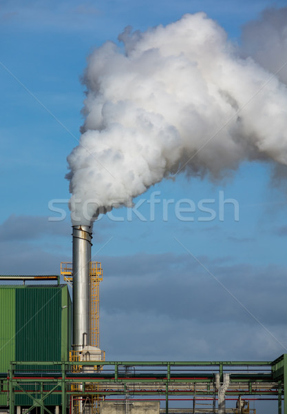 Steaming Pipe on Blue Sky Background Stock photo © Discovod