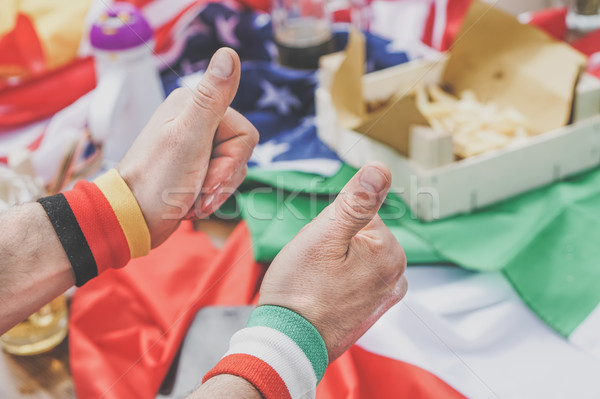 Stock photo: Group of football fans celebrate and support their national team