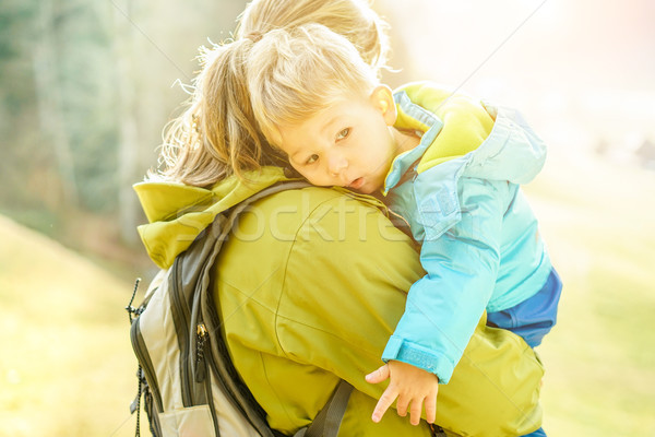 Young mother with little child doing trekking on switzerland mou Stock photo © DisobeyArt