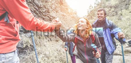 Happy friends making party,throwing confetti and using colorful  Stock photo © DisobeyArt