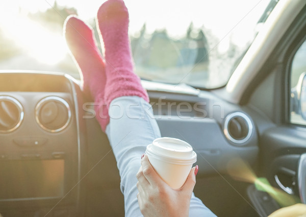 Jeunes potable café loin pieds [[stock_photo]] © DisobeyArt