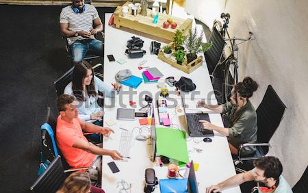 Young people working at startup - Teamwork having a meeting in c Stock photo © DisobeyArt