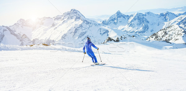 Jungen Athleten Skifahren Alpen Französisch Berge Stock foto © DisobeyArt