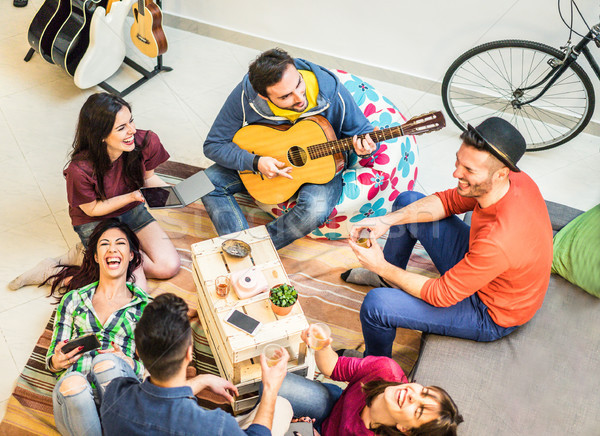 Stock photo: Trendy friends having fun in home living room - Happy young peop