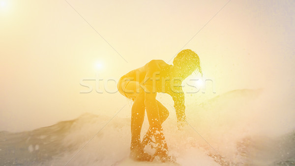 Silhouette of surfer perfoming in Australia with back light at s Stock photo © DisobeyArt