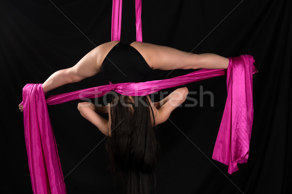 Acrobata jovem morena suspenso roxo tecido Foto stock © disorderly