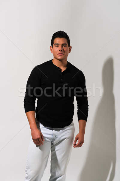 Joven negro camisa jeans oscuro Foto stock © disorderly