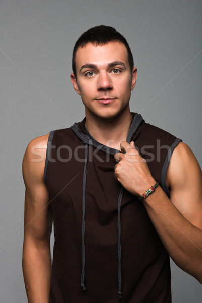 Gut aussehend junger Mann ärmellos Junge Shirt männlich Stock foto © disorderly