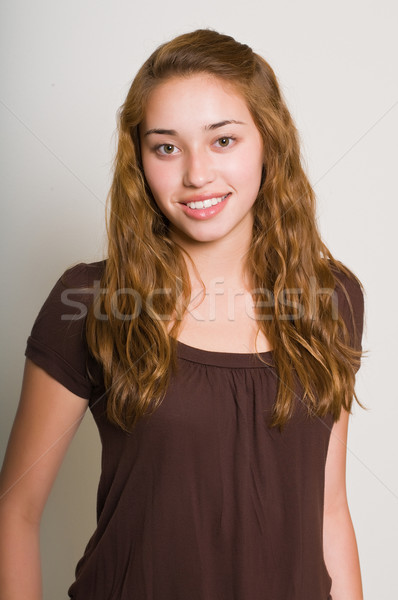Сток-фото: подростку · довольно · коричневый · блузка · волос