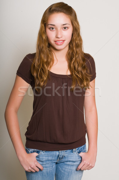 Сток-фото: подростку · довольно · коричневый · блузка · джинсов