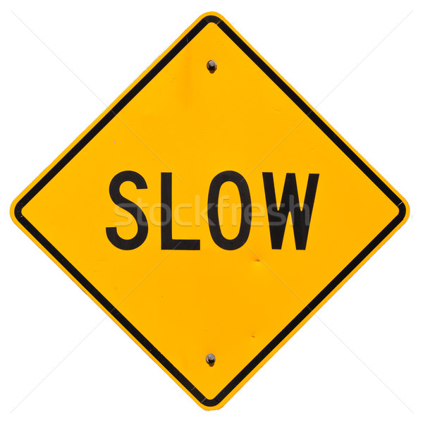 Lassú citromsárga autópálya figyelmeztető jel izolált fehér Stock fotó © disorderly