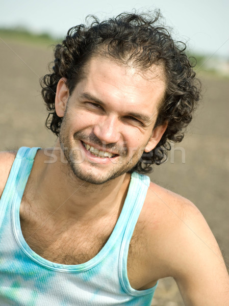 портрет красивый молодым человеком улыбаясь улыбка Сток-фото © djemphoto