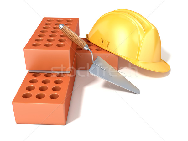 Safety helmet with round perforated bricks and trowel. 3D Stock photo © djmilic