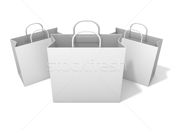 Three empty shopping paper bag Stock photo © djmilic