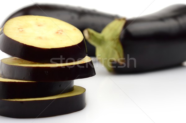 Sliced aubergine, eggplant on white background Stock photo © dla4