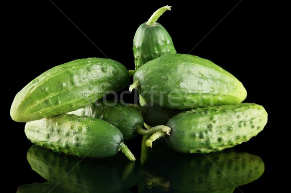 [[stock_photo]]: Beaucoup · fraîches · brut · concombres · isolé · noir