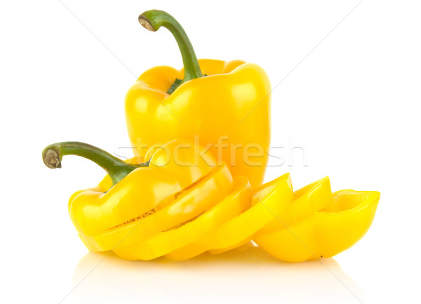 Studio shot of slices of yellow bell peppers on white Stock photo © dla4