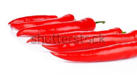 Perspective view of red peppers isolated white background Stock photo © dla4