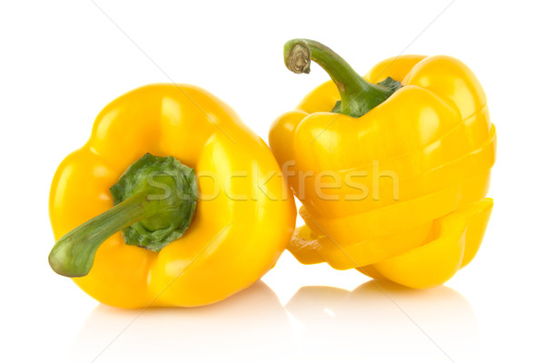  Studio shot of slices of yellow bell peppers on white Stock photo © dla4